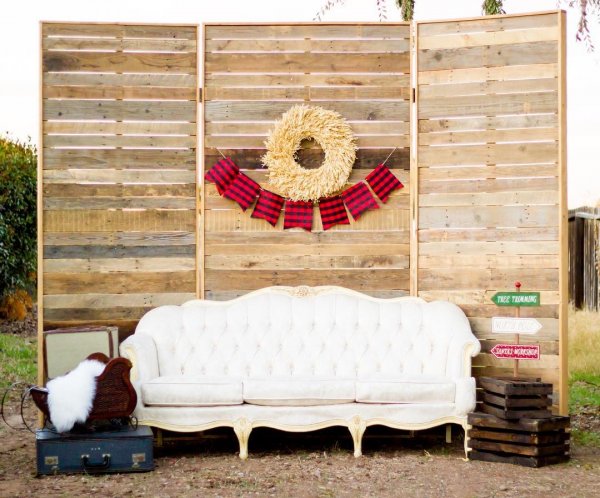 Moody Bohemian Styled Shoot trifold backdrop Belle couch crates suitcases